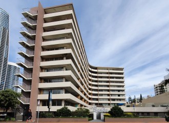 Image of 12 storey Modernist apartment building.